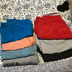 Four lululemon shirts and three shorts L